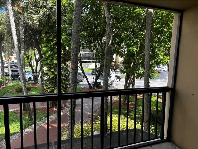 a view of a garden with a fountain