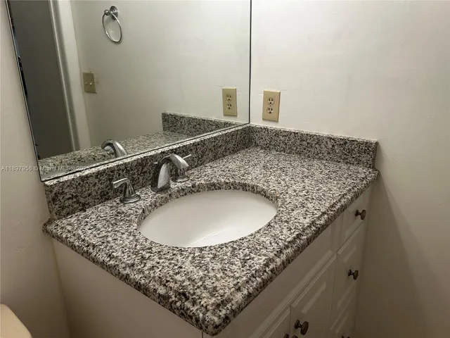 a kitchen with a stove and a microwave