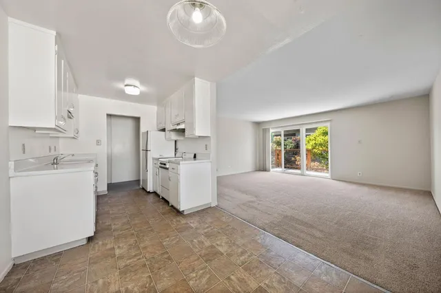 a balcony view with an outdoor seating space