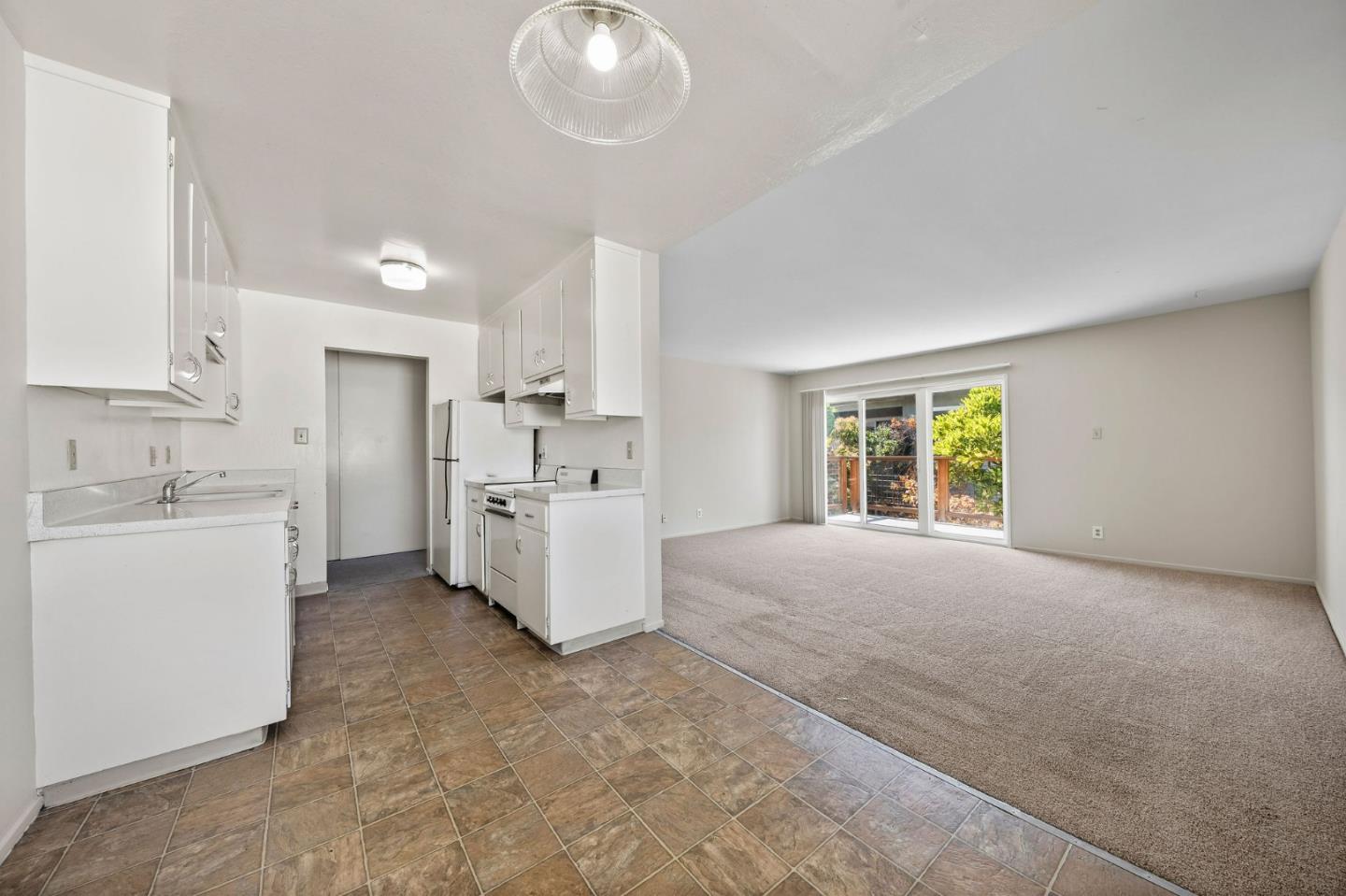 620 Masonic Way Belmont, CA 94002 - Photo 2 of 8 a view of a kitchen with appliances and cabinets