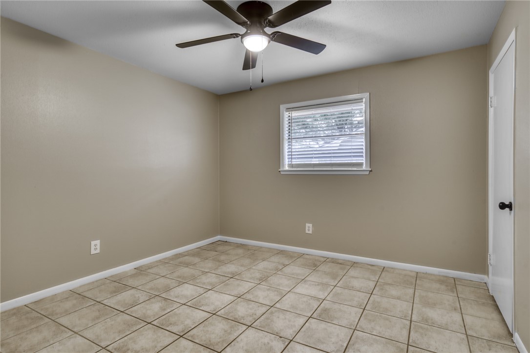 1212 Ridgefield Circle South College Station, TX 77840 - Photo 21 of 23 a view of an empty room and window