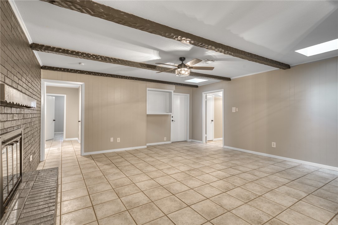 1212 Ridgefield Circle South College Station, TX 77840 - Photo 10 of 23 a view of a hallway with wooden floor and chandelier