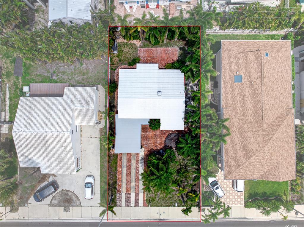 16107 Gulf Boulevard Redington Beach, FL 33708 - Photo 12 of 50 aerial view of a house with a garden