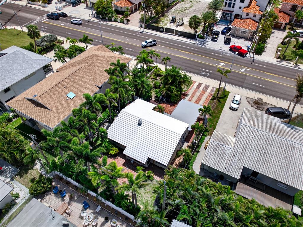 16107 Gulf Boulevard Redington Beach, FL 33708 - Photo 13 of 50 an aerial view of a house with a garden and pathway