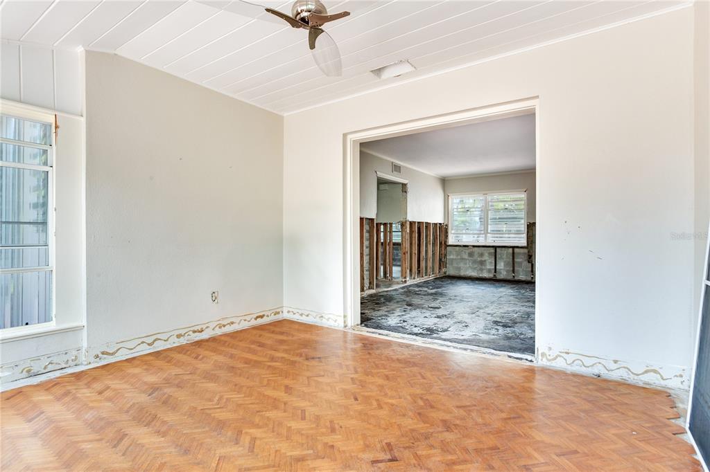 16107 Gulf Boulevard Redington Beach, FL 33708 - Photo 19 of 50 an empty room with closet and a chandelier fan
