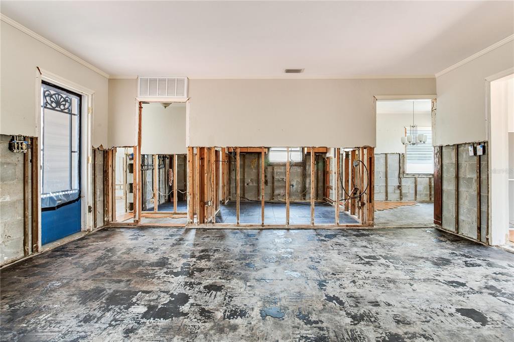 16107 Gulf Boulevard Redington Beach, FL 33708 - Photo 22 of 50 a view of a room with floor to ceiling windows and entryway