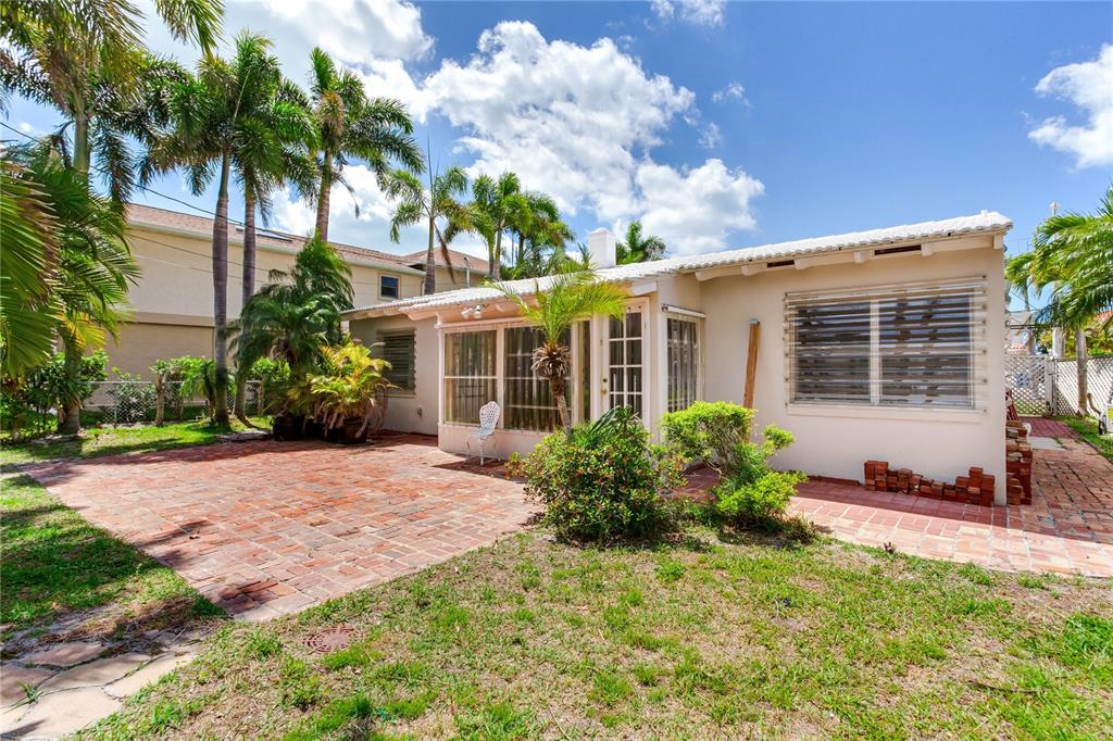 16107 Gulf Boulevard Redington Beach, FL 33708 - Photo 38 of 50 a front view of house with yard and green space
