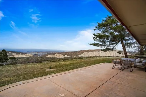 a view of a lake with a big yard