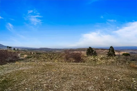 a view of mountain with lake