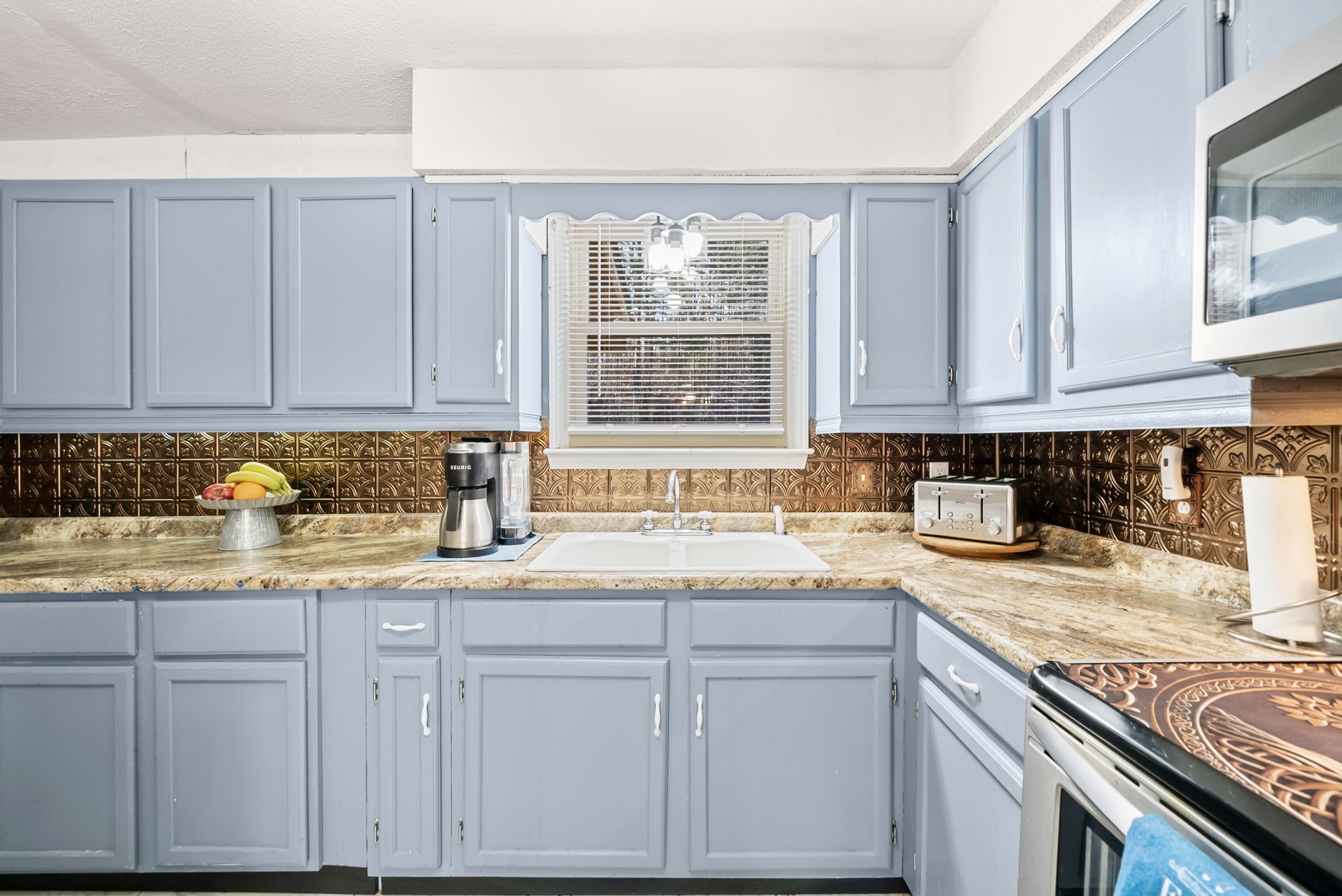160 Terrapin Run Road Dover, TN 37058 - Photo 12 of 37 a kitchen with granite countertop white cabinets and white appliances