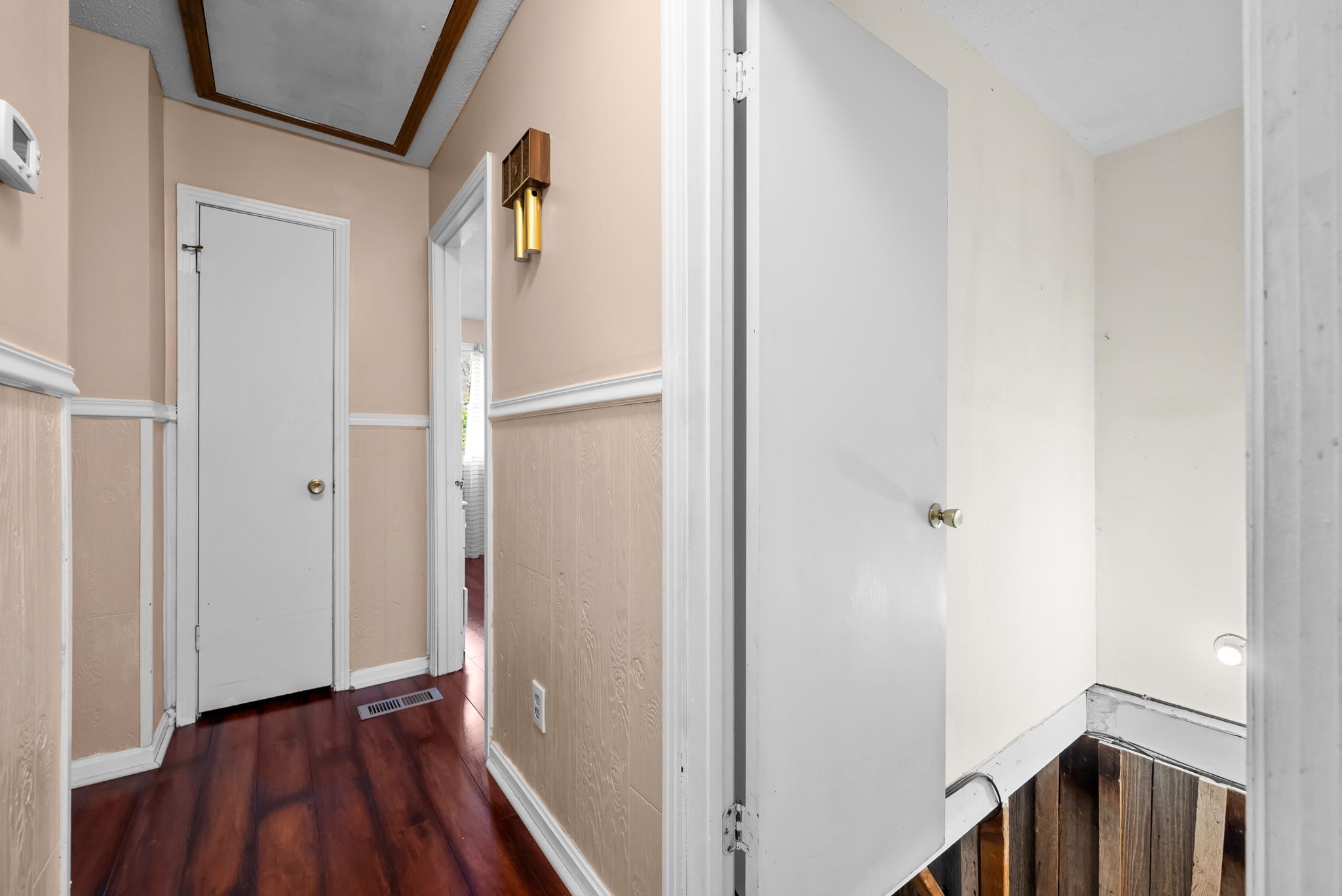 160 Terrapin Run Road Dover, TN 37058 - Photo 18 of 37 a view of a hallway with wooden floor and staircase