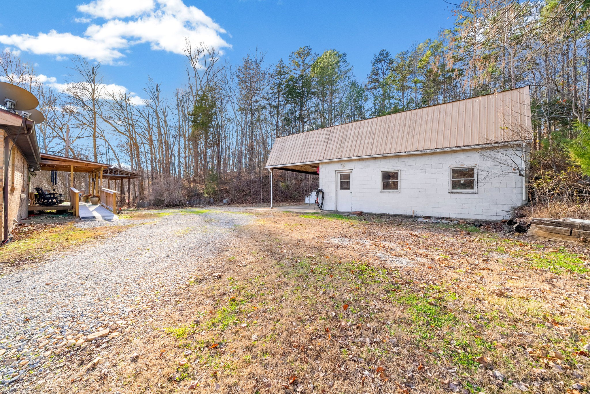 160 Terrapin Run Road Dover, TN 37058 - Photo 26 of 37 a view of a house with a yard covered with snow