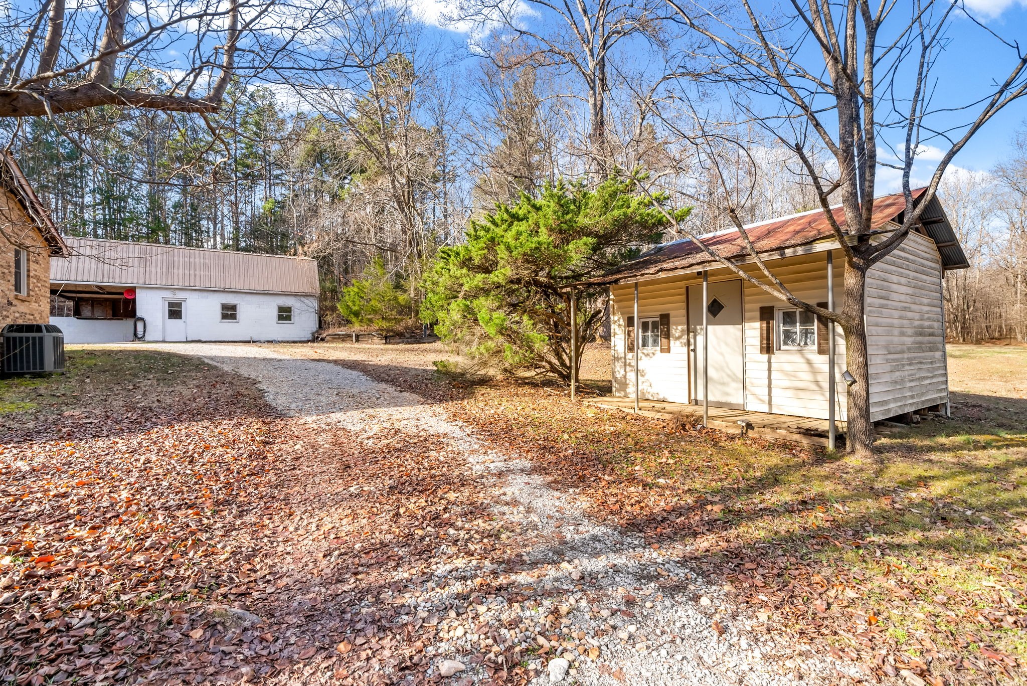 160 Terrapin Run Road Dover, TN 37058 - Photo 27 of 37 a house with a tree in front of it