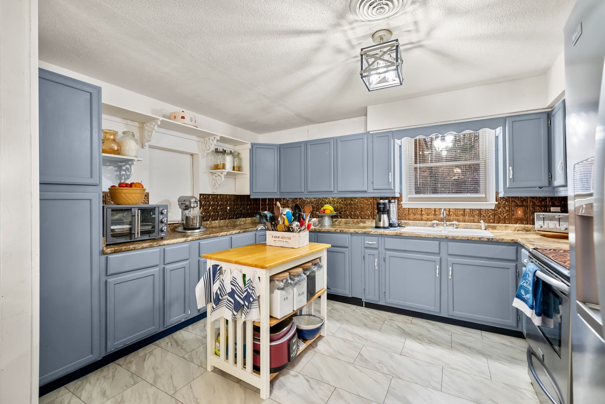 160 Terrapin Run Road Dover, TN 37058 - Photo 9 of 37 a kitchen with stainless steel appliances granite countertop a sink and cabinets