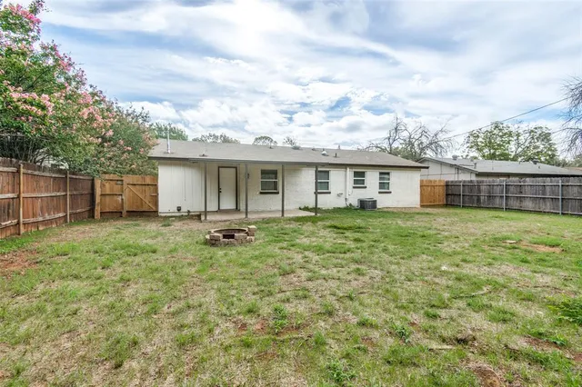 a house view with a garden space