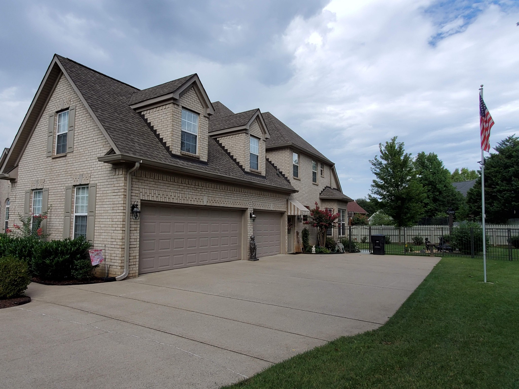 1523 Winterberry Drive Murfreesboro, TN 37130 - Photo 2 of 42 a front view of a house with garden