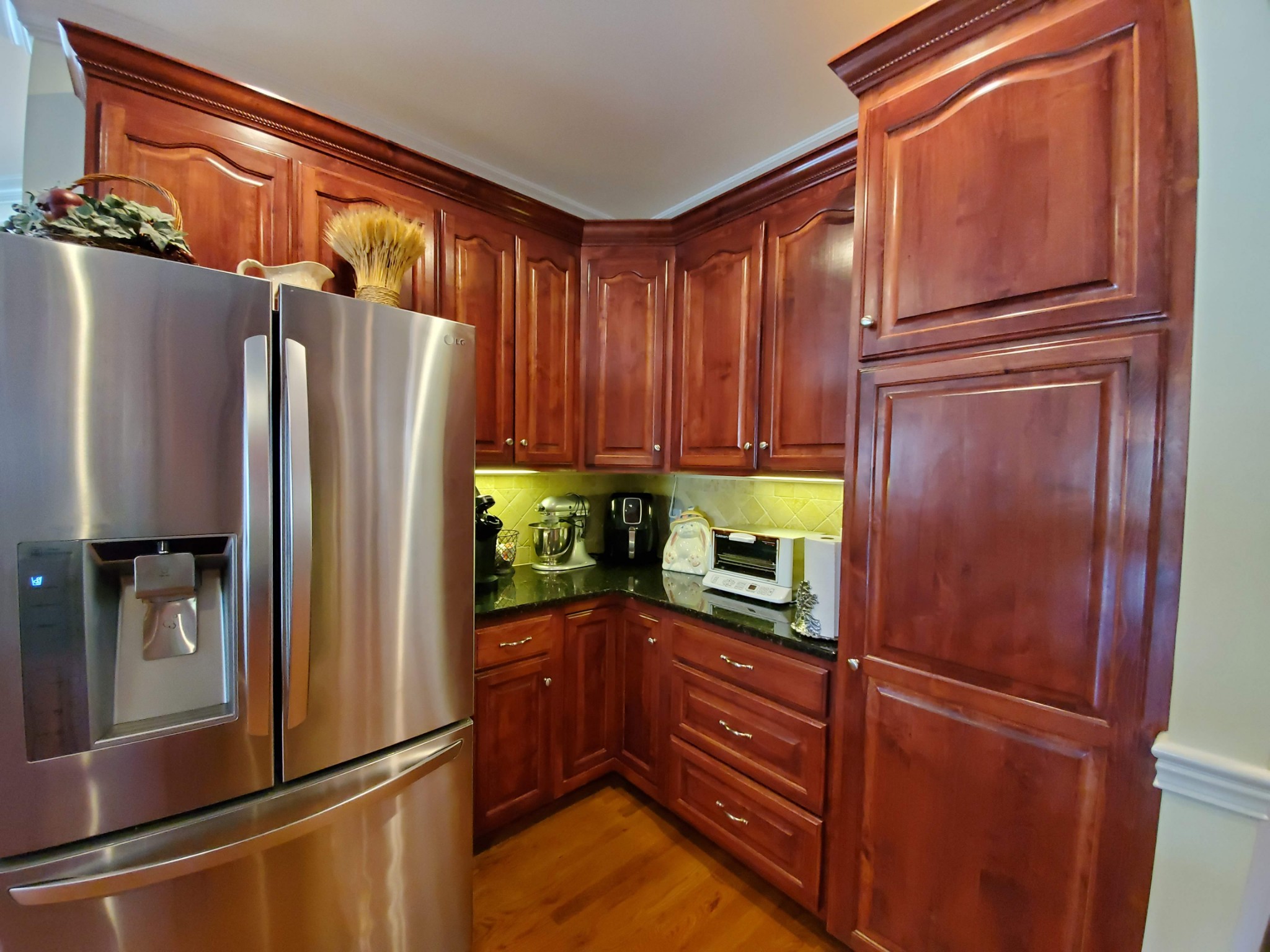 1523 Winterberry Drive Murfreesboro, TN 37130 - Photo 21 of 42 a kitchen with stainless steel appliances granite countertop a refrigerator and a sink