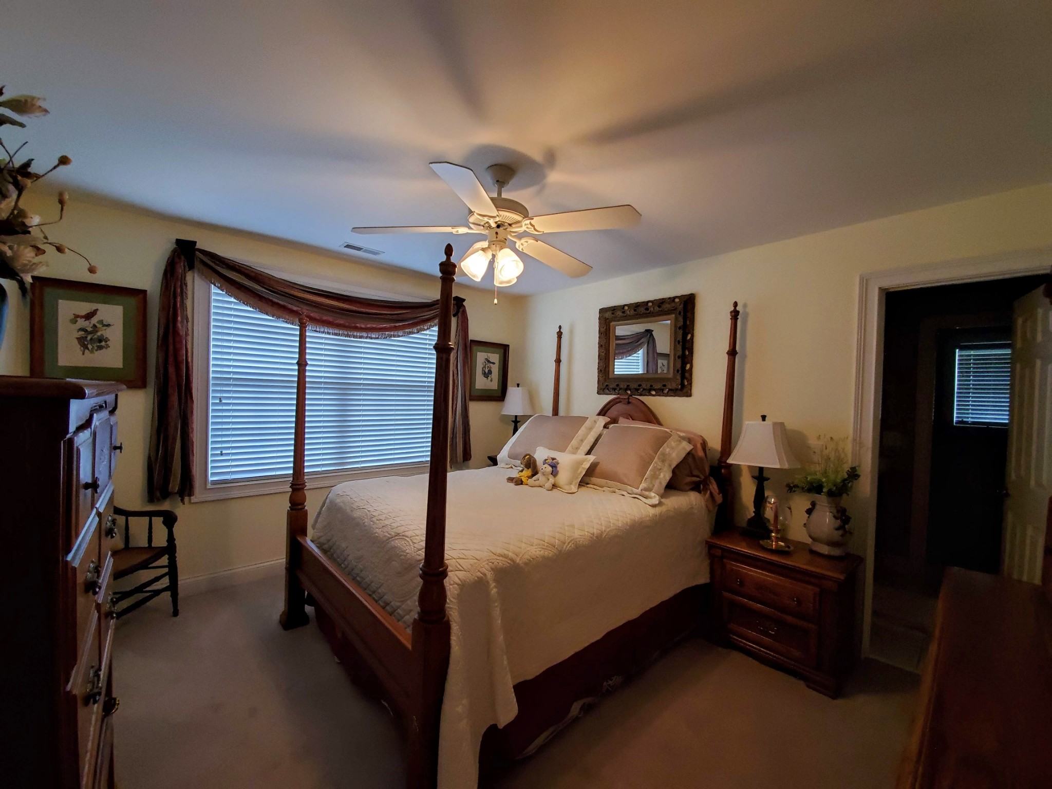 1523 Winterberry Drive Murfreesboro, TN 37130 - Photo 27 of 42 a bedroom with bed and a chandelier