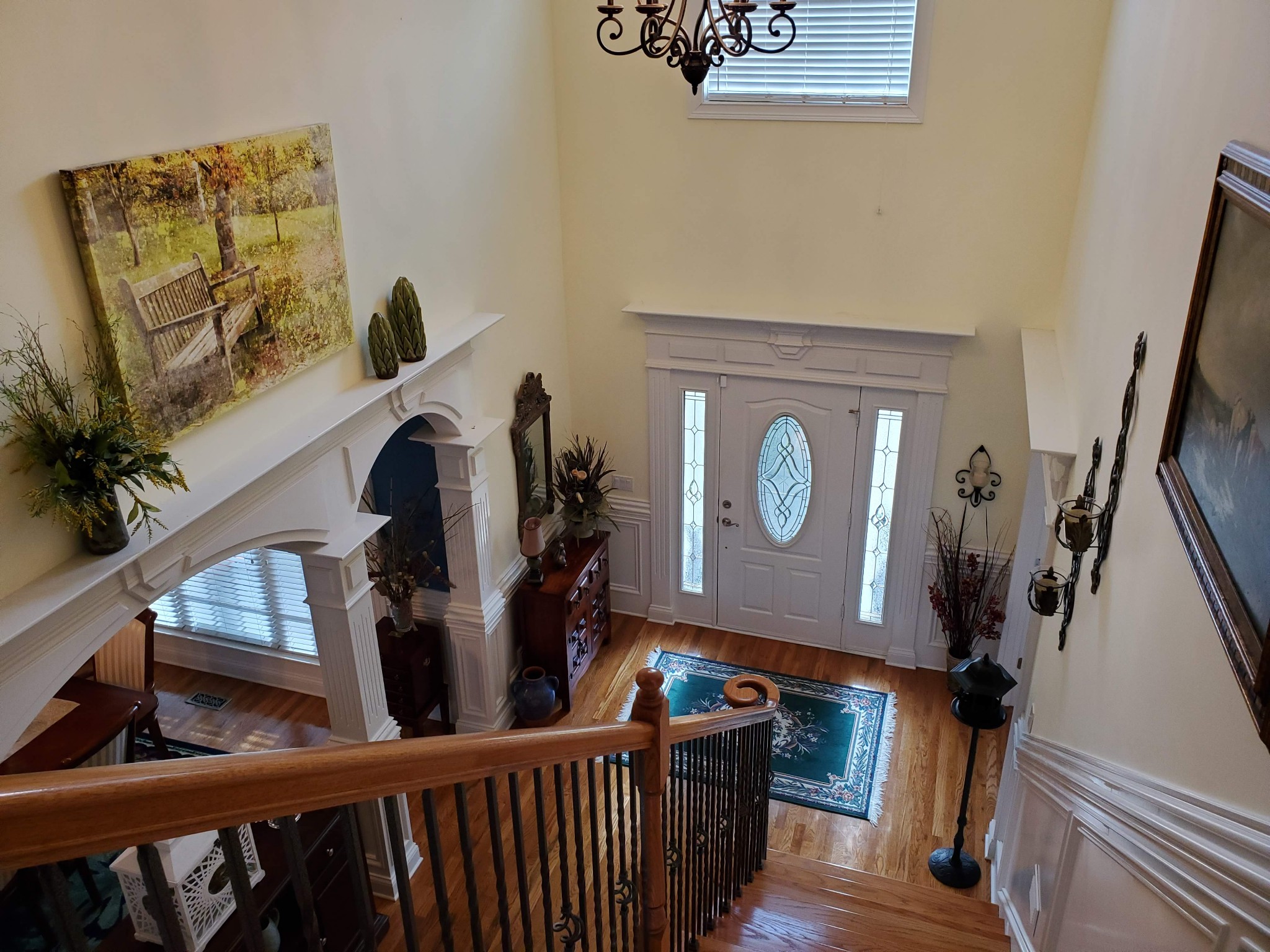 1523 Winterberry Drive Murfreesboro, TN 37130 - Photo 34 of 42 a view of a hallway with wooden floor and a white car parked