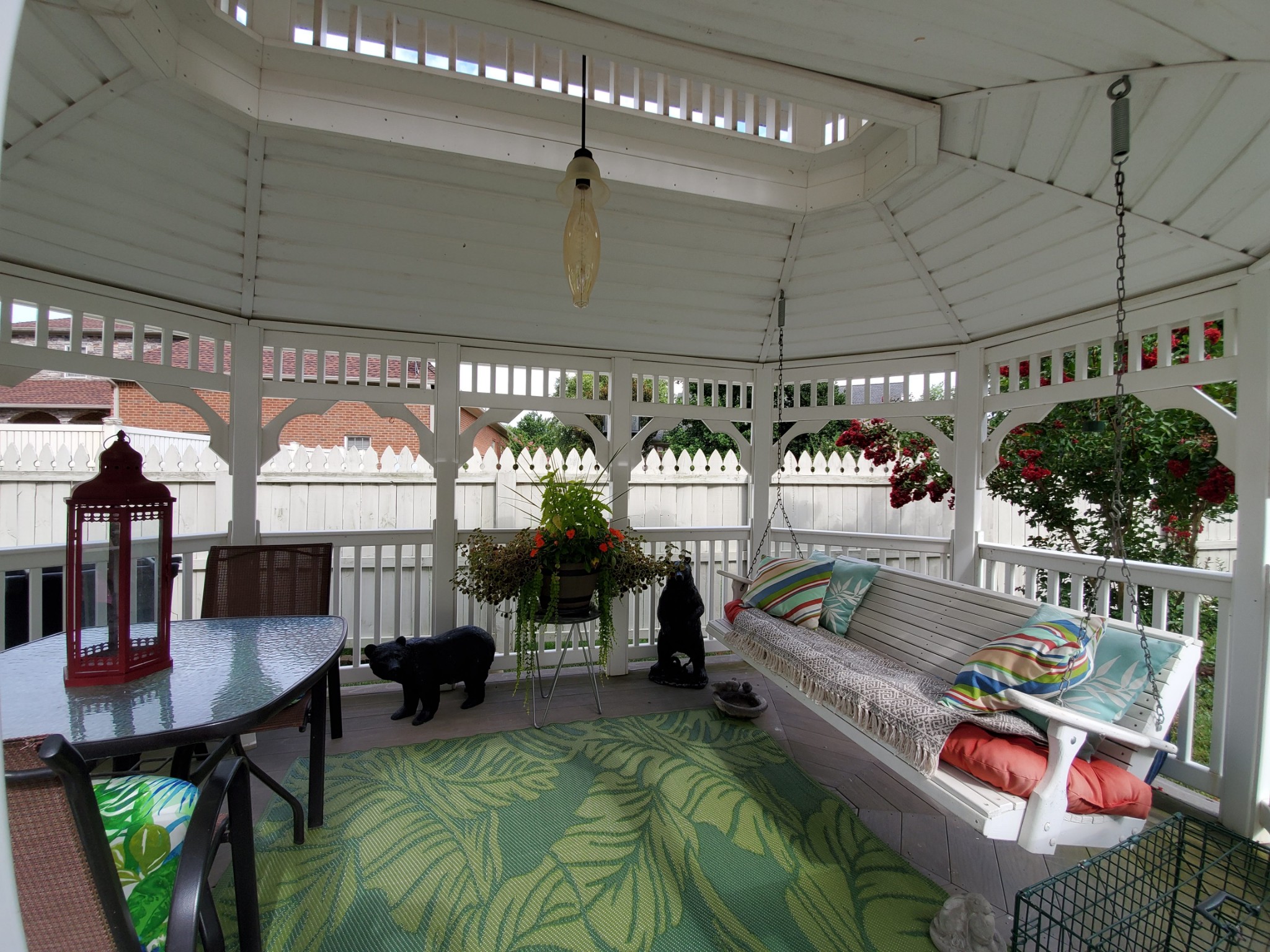 1523 Winterberry Drive Murfreesboro, TN 37130 - Photo 38 of 42 a living room with furniture a chandelier and a floor to ceiling window