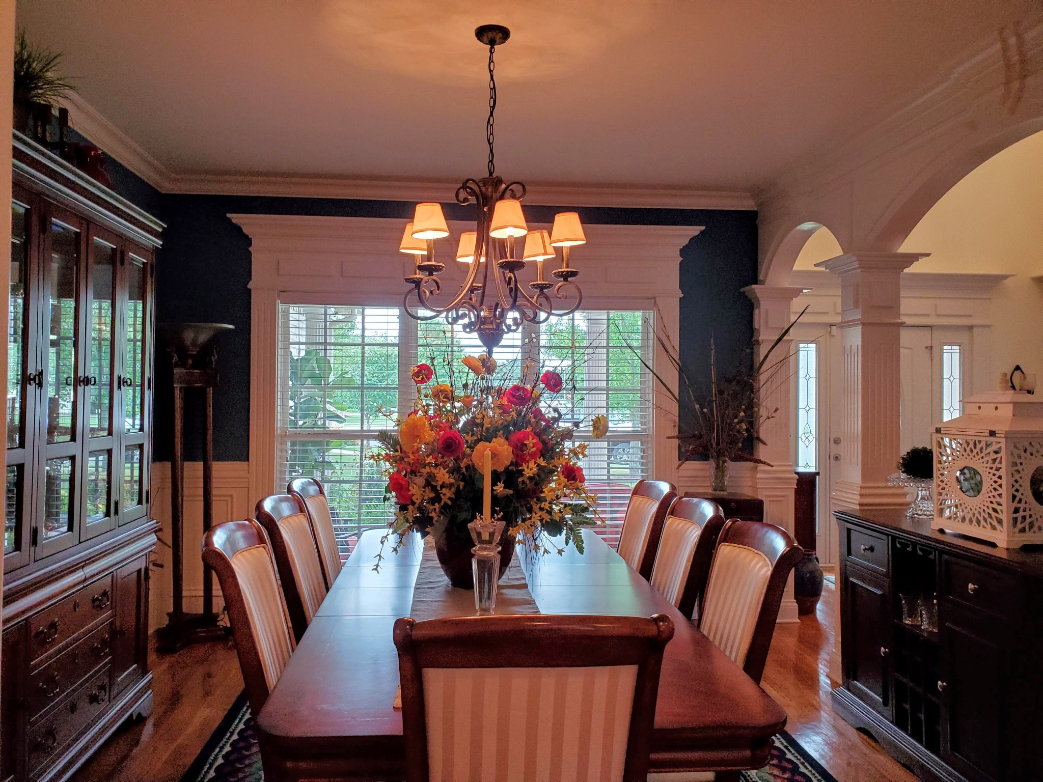 1523 Winterberry Drive Murfreesboro, TN 37130 - Photo 6 of 42 a dining room with furniture a chandelier and wooden floor
