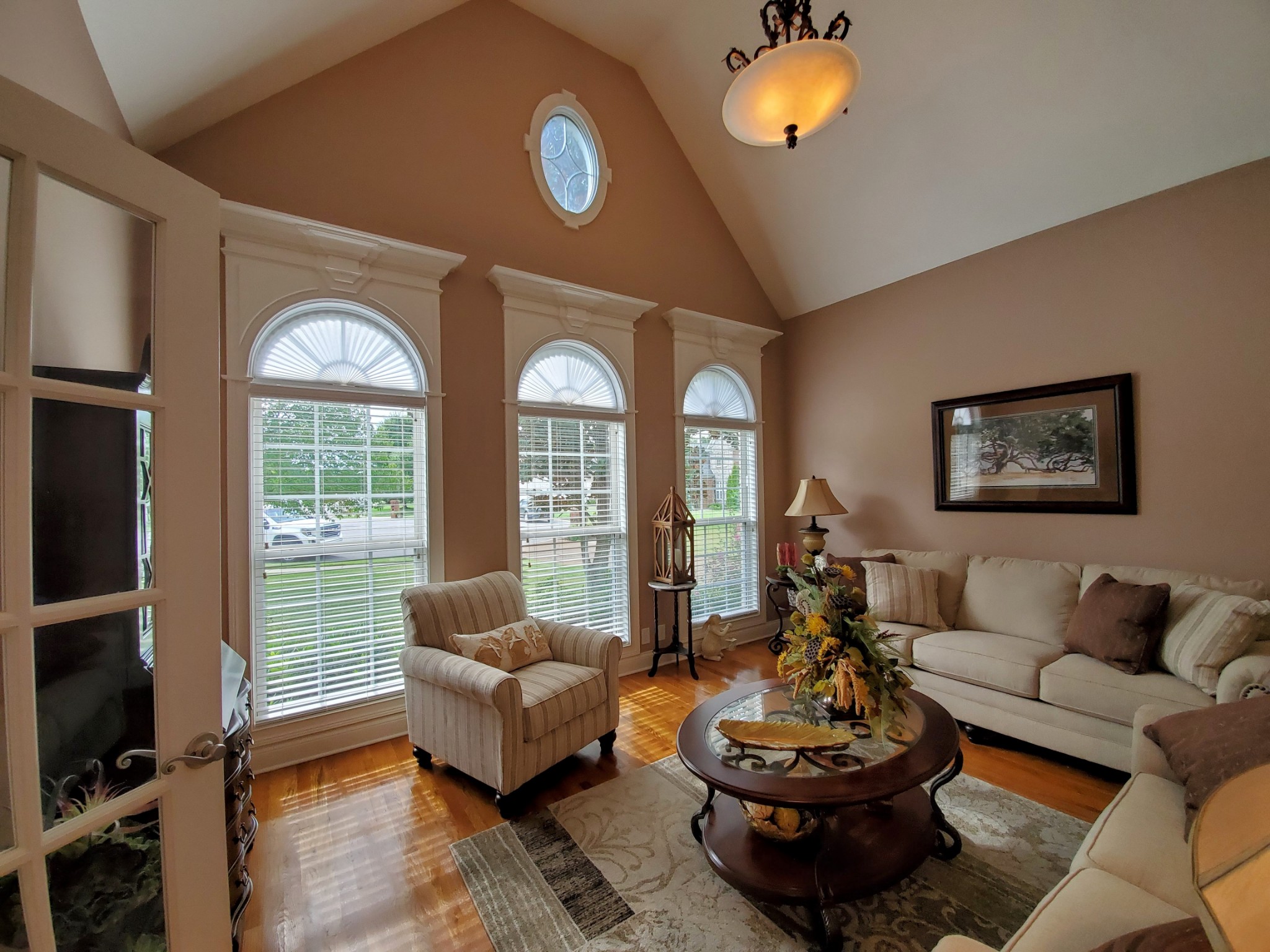 1523 Winterberry Drive Murfreesboro, TN 37130 - Photo 8 of 42 a living room with furniture a window and a flat screen tv