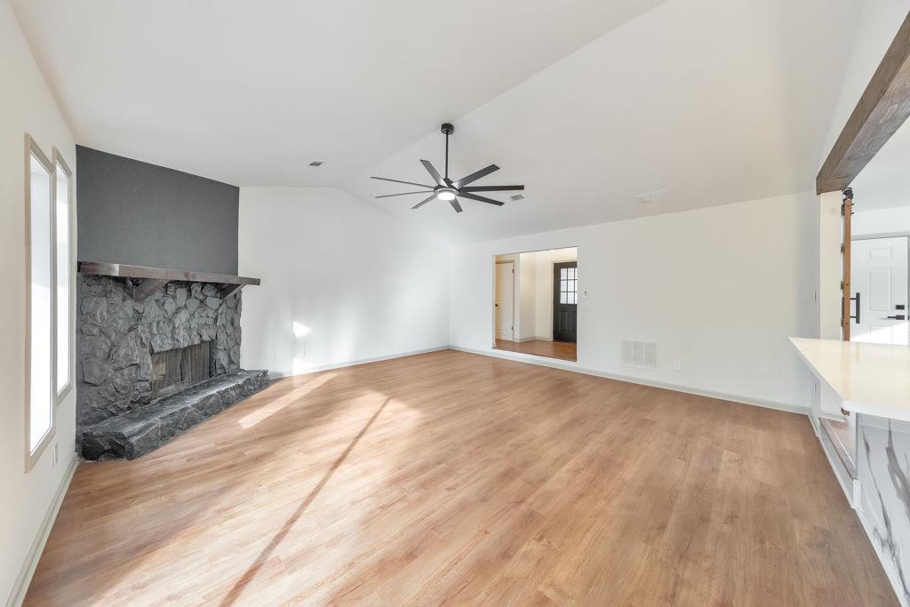 1535 Rucker Road Alpharetta, GA 30009 - Photo 11 of 42 a view of empty room with wooden floor and fan