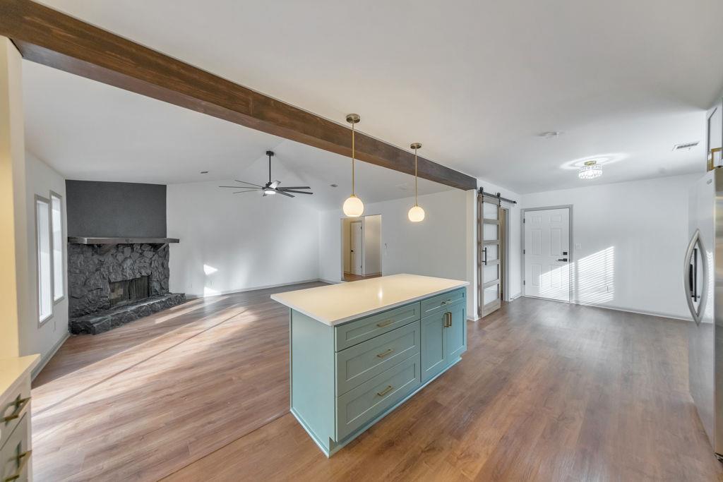 1535 Rucker Road Alpharetta, GA 30009 - Photo 15 of 42 a spacious bathroom with a granite countertop sink a toilet a mirror and shower