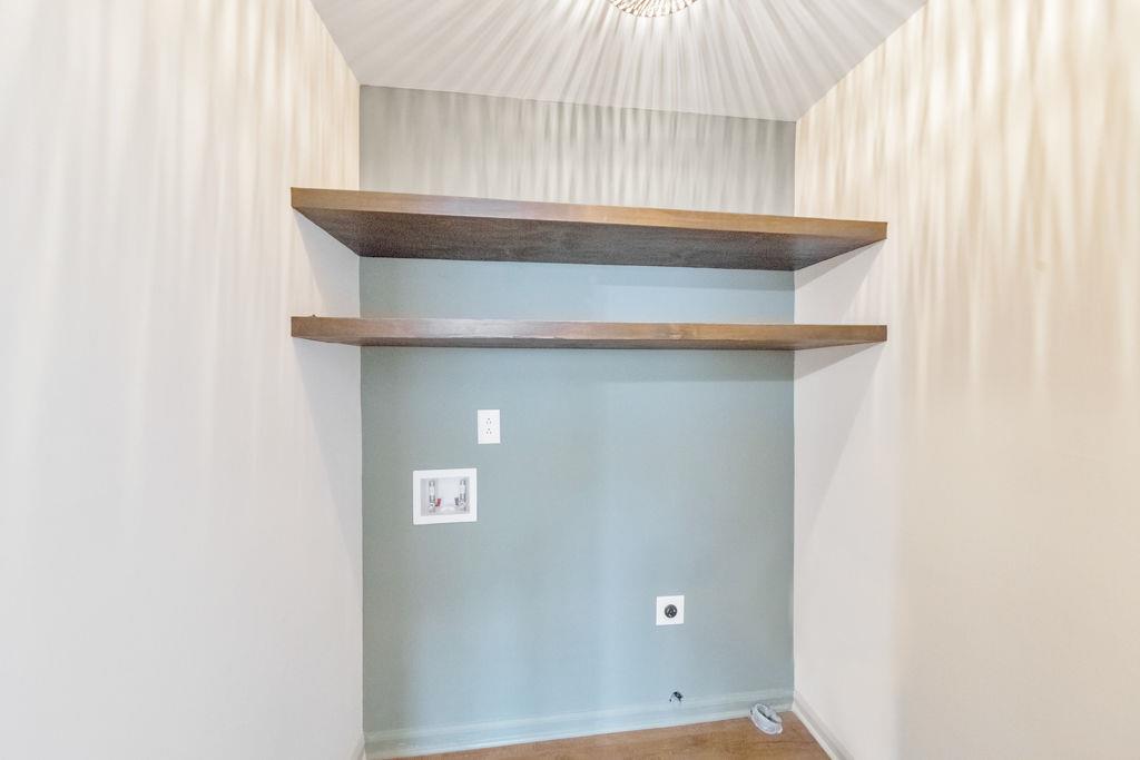 1535 Rucker Road Alpharetta, GA 30009 - Photo 19 of 42 a bathroom with a sink and vanity