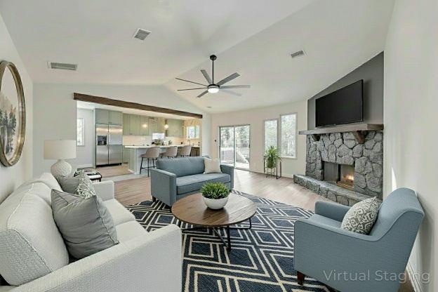 1535 Rucker Road Alpharetta, GA 30009 - Photo 2 of 42 a living room with fireplace furniture and a flat screen tv