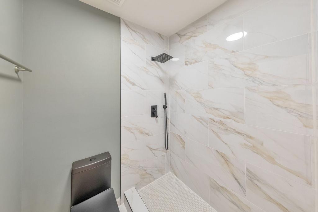 1535 Rucker Road Alpharetta, GA 30009 - Photo 25 of 42 a bathroom with a shower