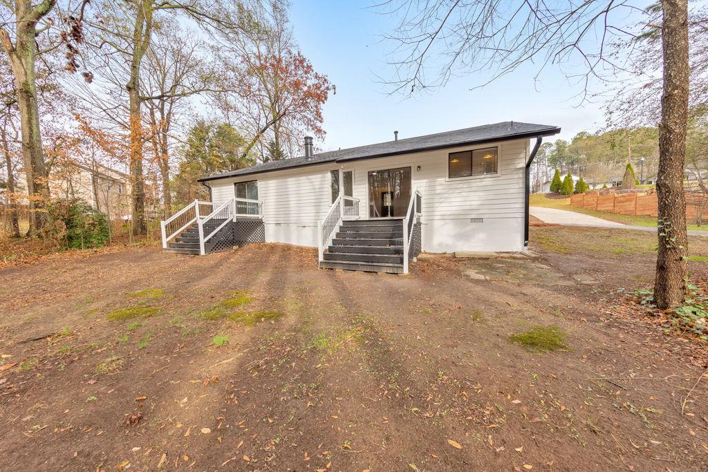 1535 Rucker Road Alpharetta, GA 30009 - Photo 33 of 42 a view of a house with a yard