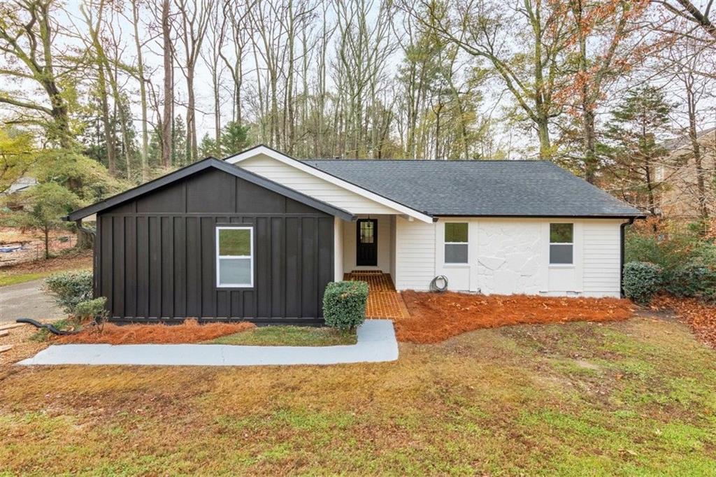 1535 Rucker Road Alpharetta, GA 30009 - Photo 37 of 42 a house with trees in the background