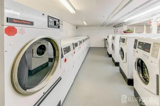 a view of a swimming pool and lounge chair