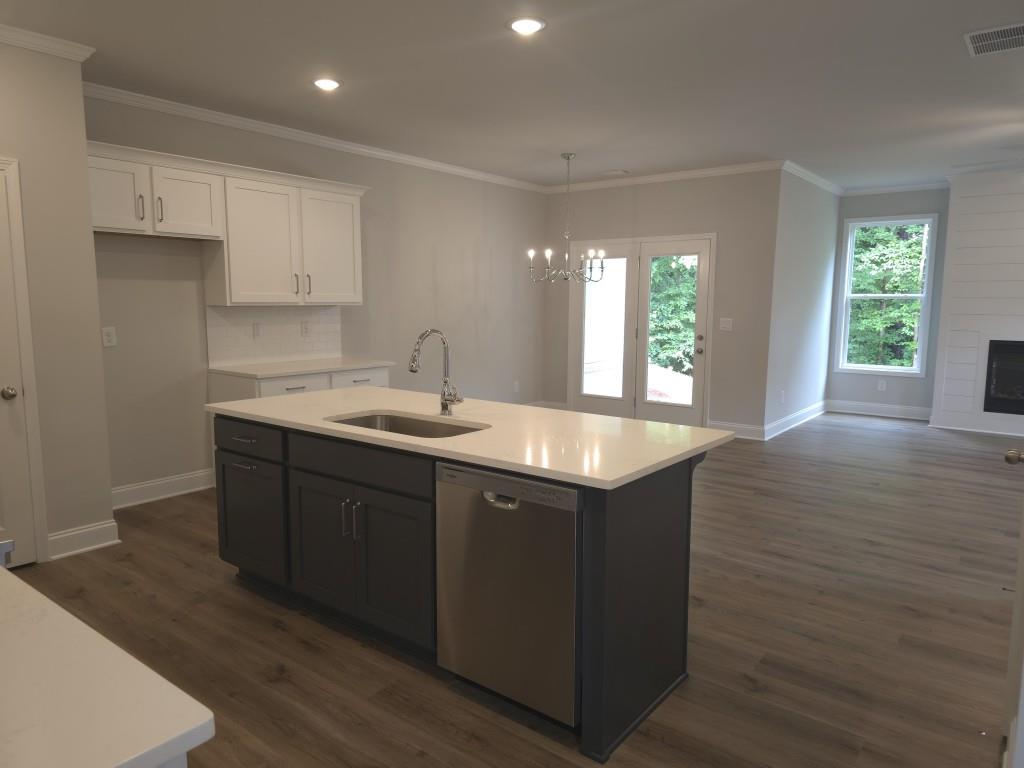 4240 Cavalier Way Duluth, GA 30097 - Photo 4 of 46 a kitchen with sink and window