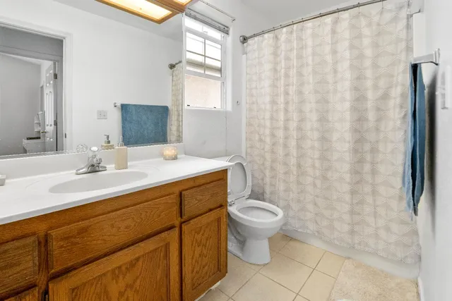 a bathroom with a toilet and a sink