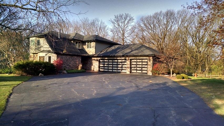 11662 Bend River Road Roscoe, IL 61073 - Photo 1 of 61 a view of outdoor space and yard