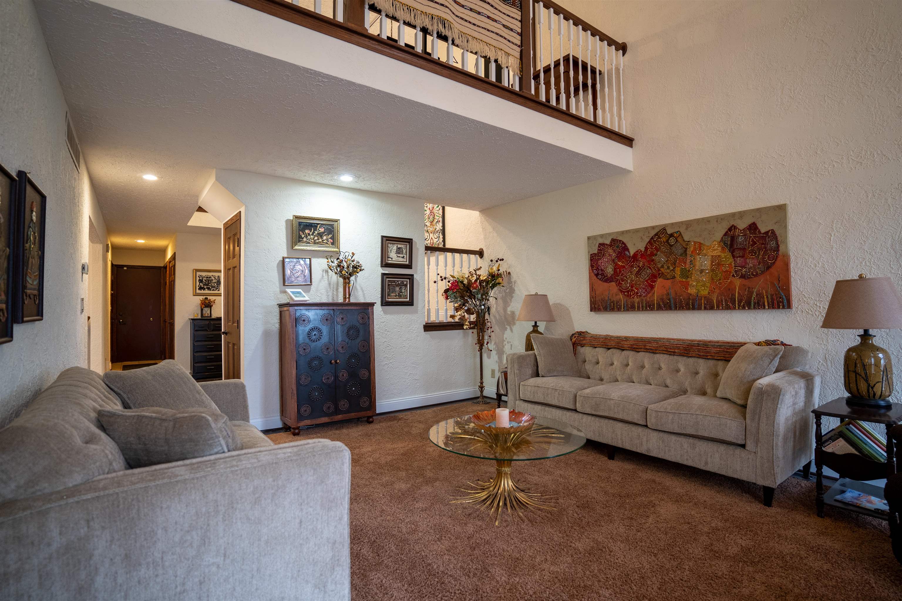 11662 Bend River Road Roscoe, IL 61073 - Photo 18 of 61 a living room with furniture and a wooden floor