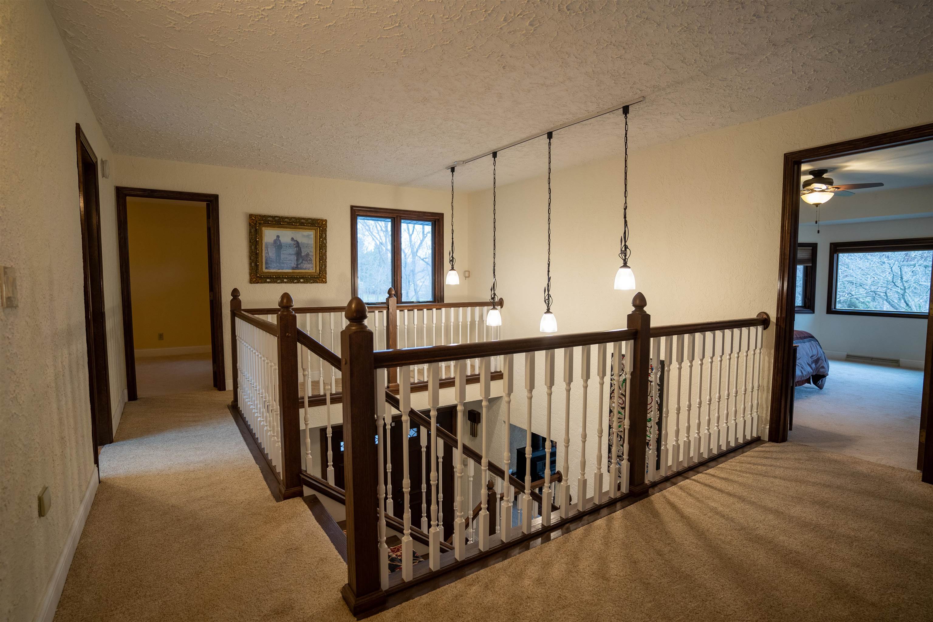 11662 Bend River Road Roscoe, IL 61073 - Photo 26 of 61 a view of a hallway with window and stairs