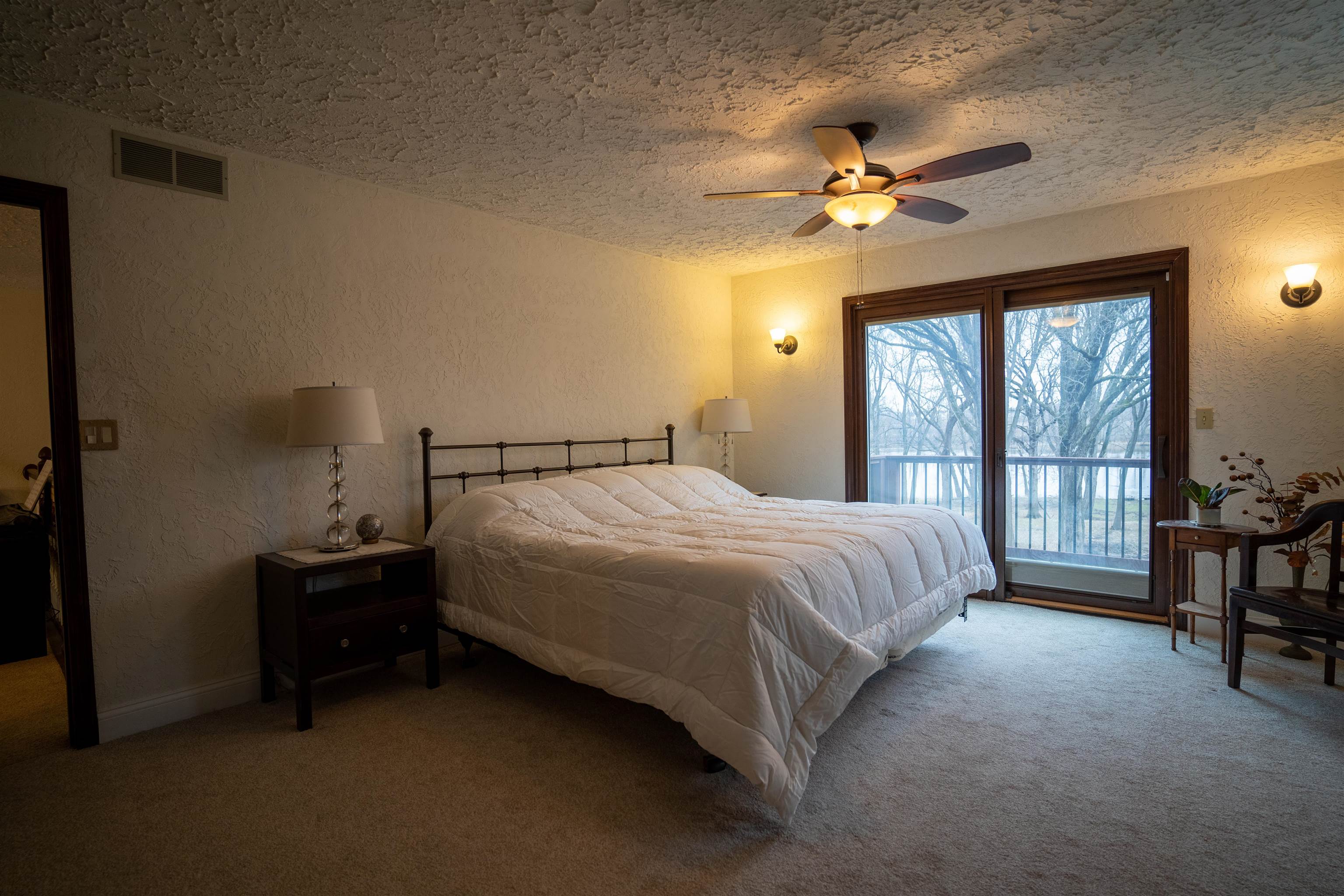 11662 Bend River Road Roscoe, IL 61073 - Photo 27 of 61 a bedroom with a bed and window
