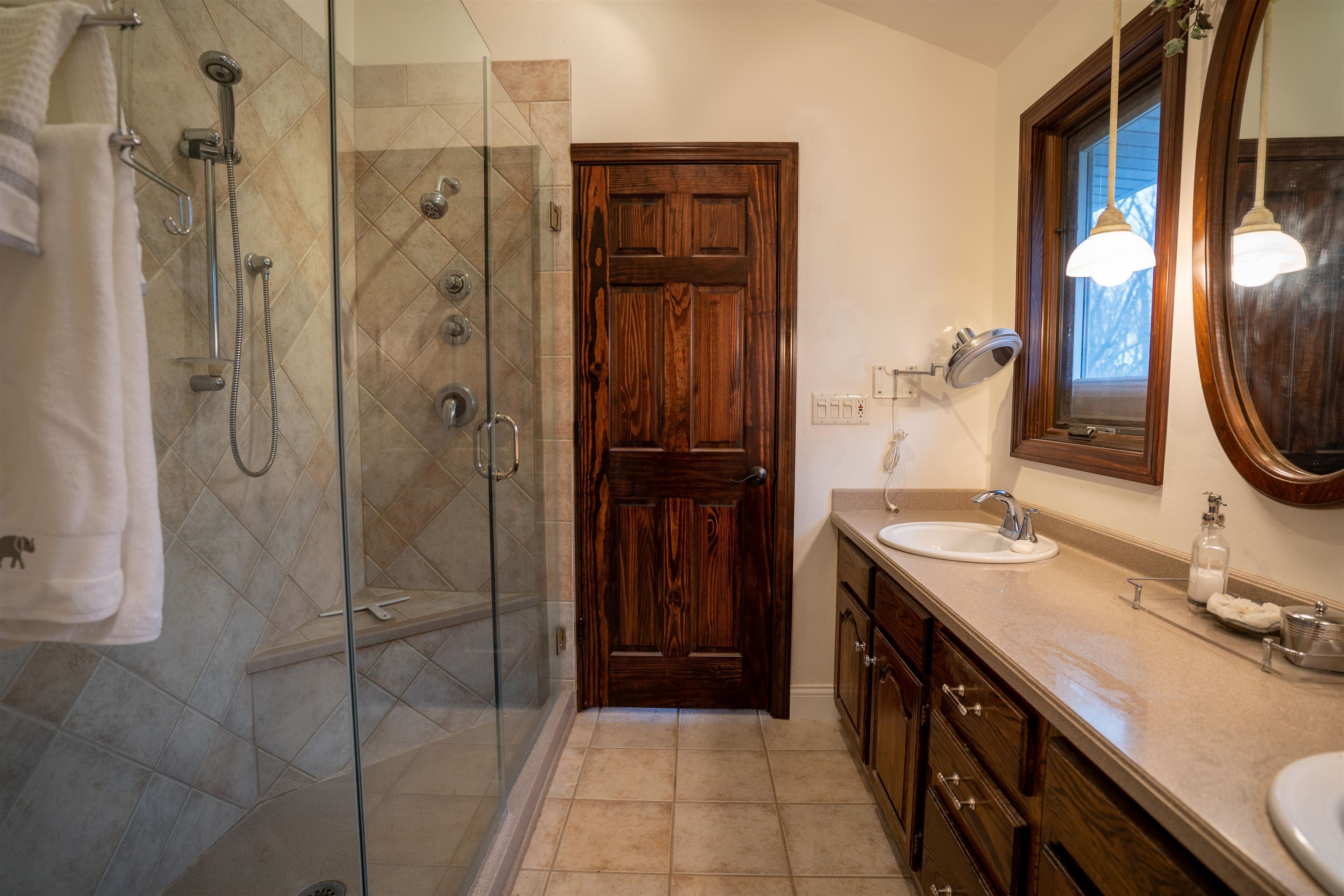 11662 Bend River Road Roscoe, IL 61073 - Photo 32 of 61 a bathroom with a sink a toilet and shower
