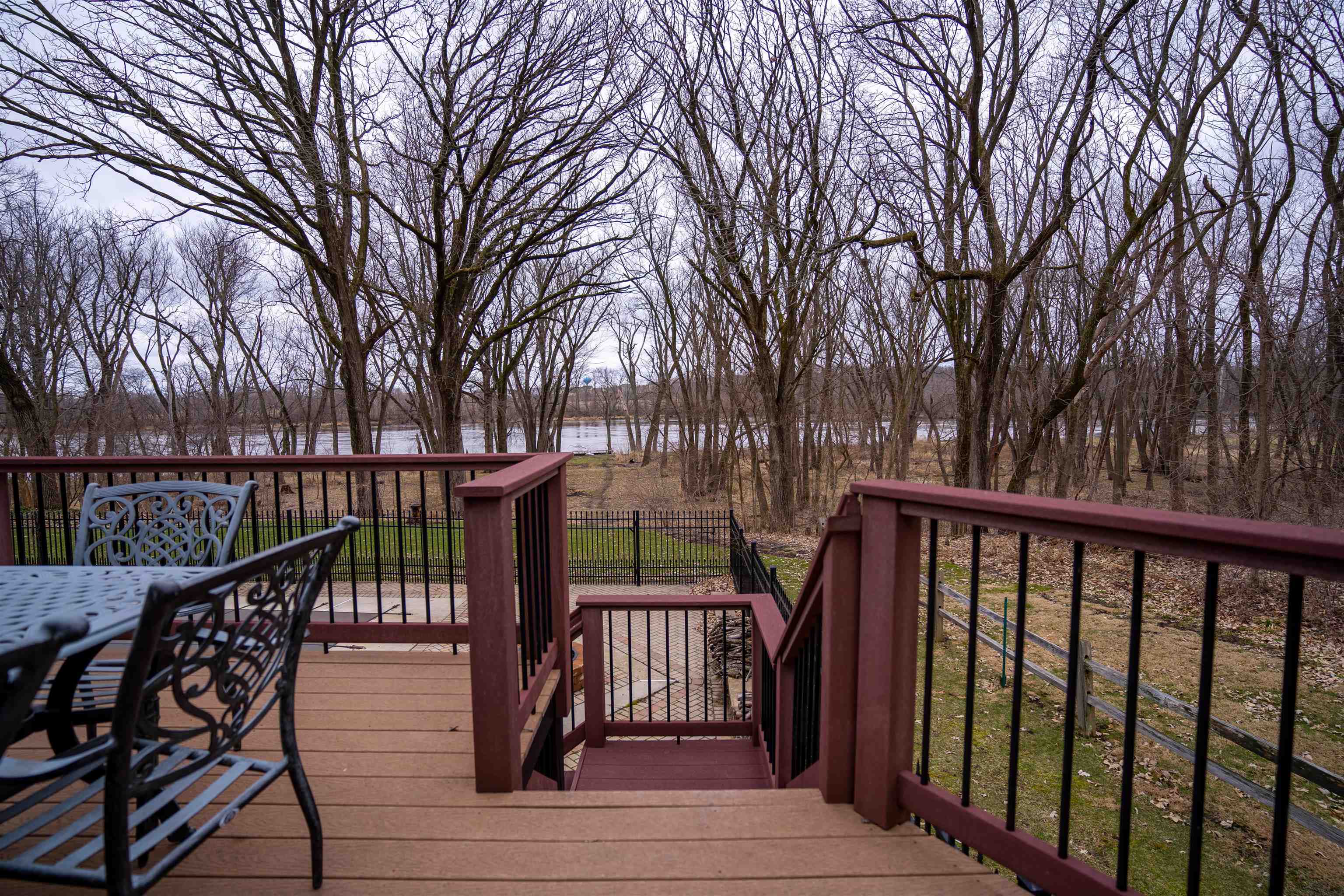 11662 Bend River Road Roscoe, IL 61073 - Photo 33 of 61 a view of a balcony with wooden floor and fence