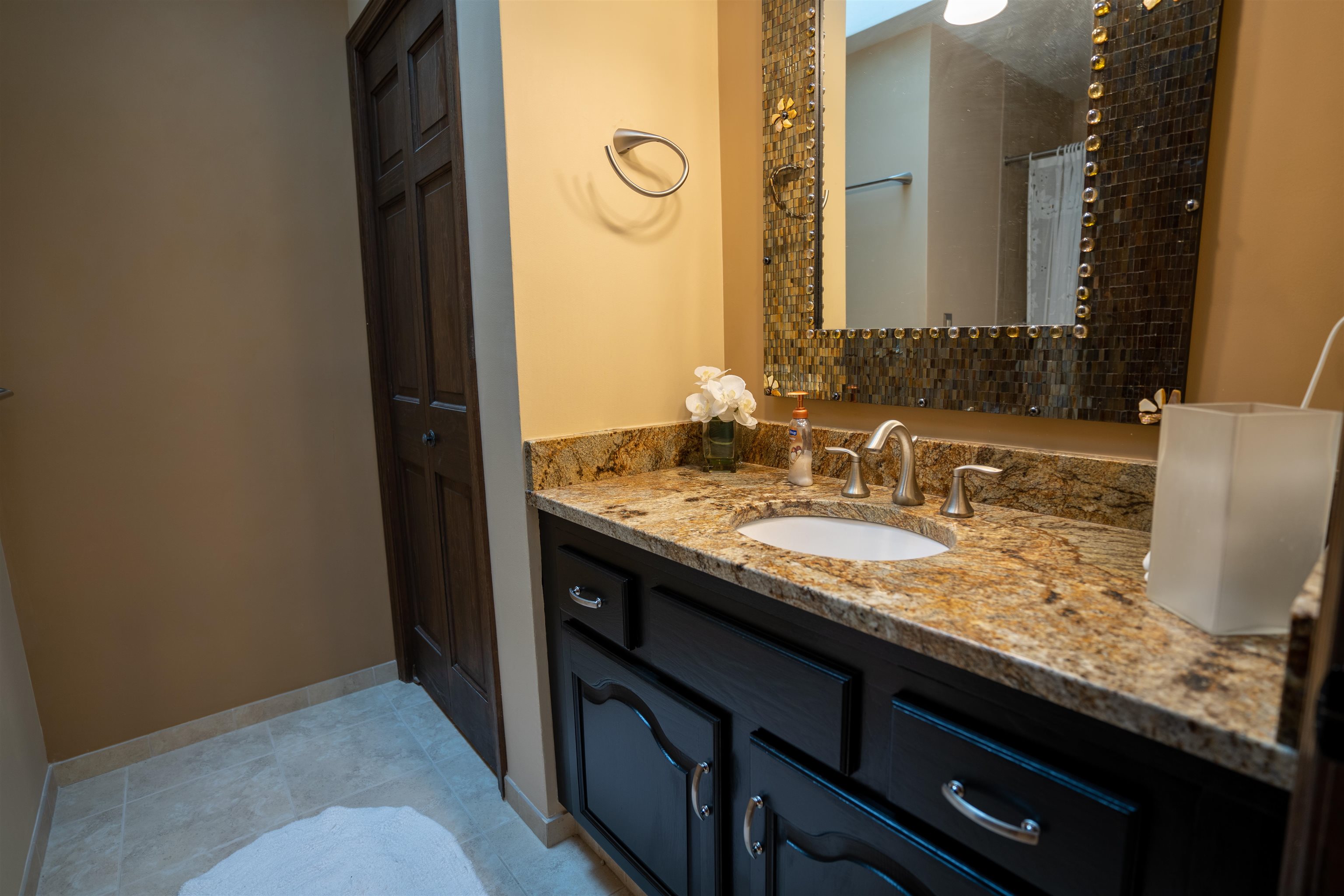11662 Bend River Road Roscoe, IL 61073 - Photo 34 of 61 a bathroom with a granite countertop sink and a mirror