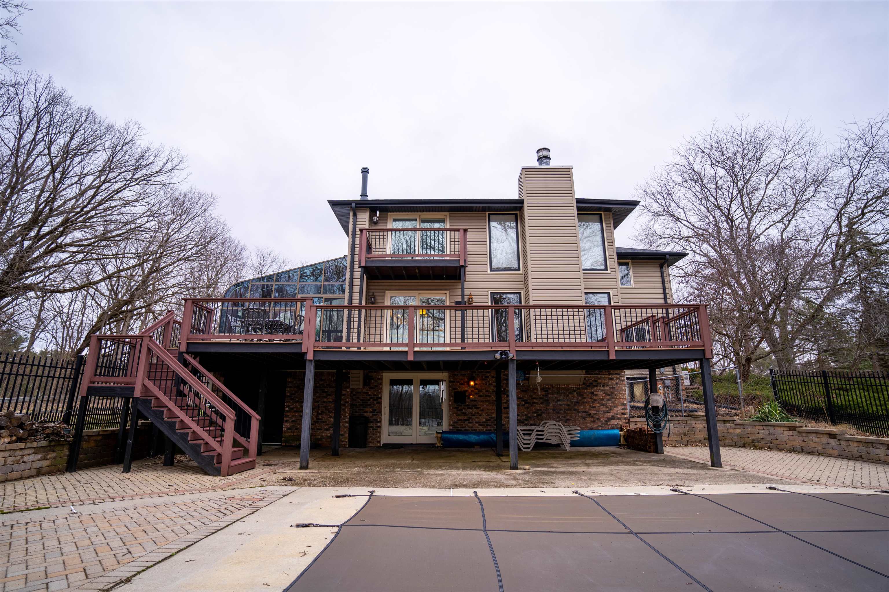 11662 Bend River Road Roscoe, IL 61073 - Photo 38 of 61 a view of a house with a balcony and deck