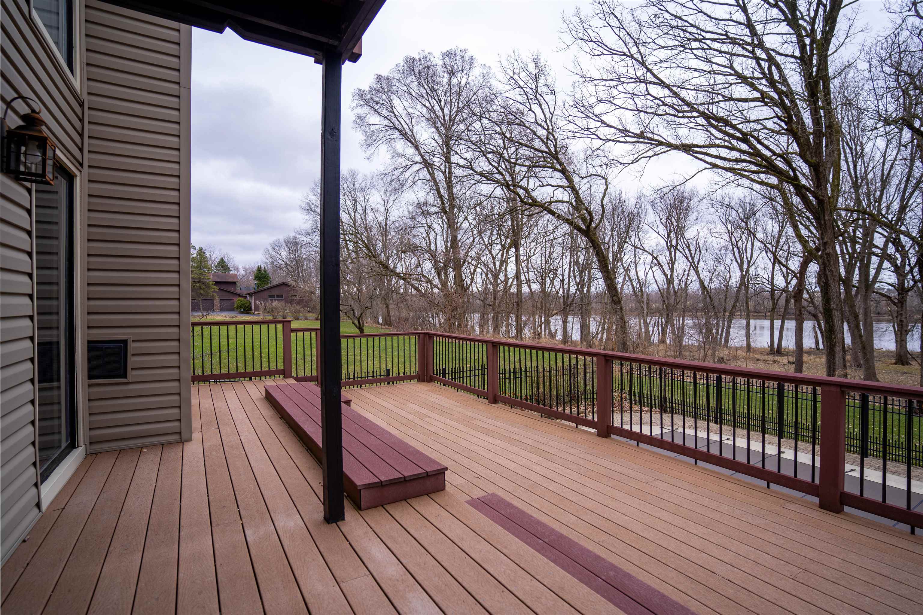 11662 Bend River Road Roscoe, IL 61073 - Photo 41 of 61 a view of a balcony with wooden floor