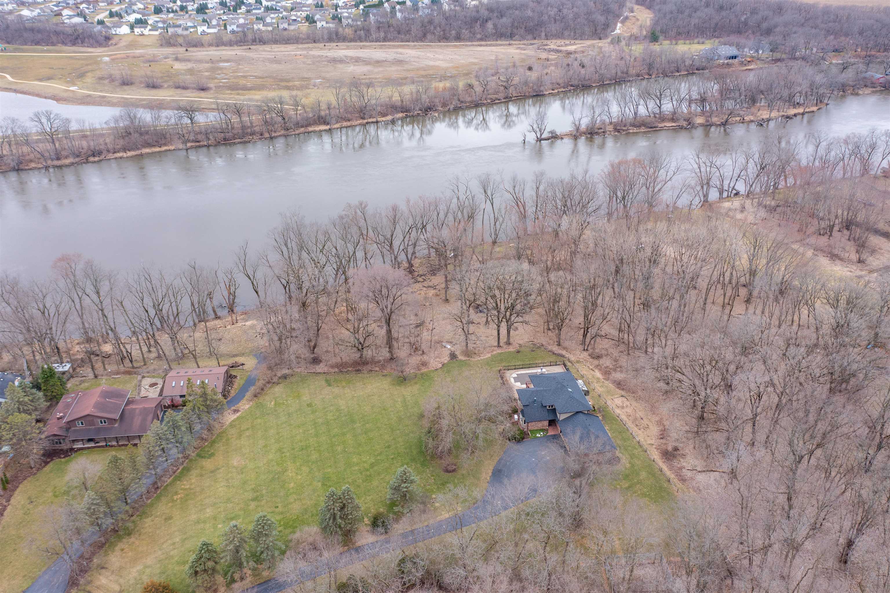 11662 Bend River Road Roscoe, IL 61073 - Photo 46 of 61 a view of a lake in between of two of trees