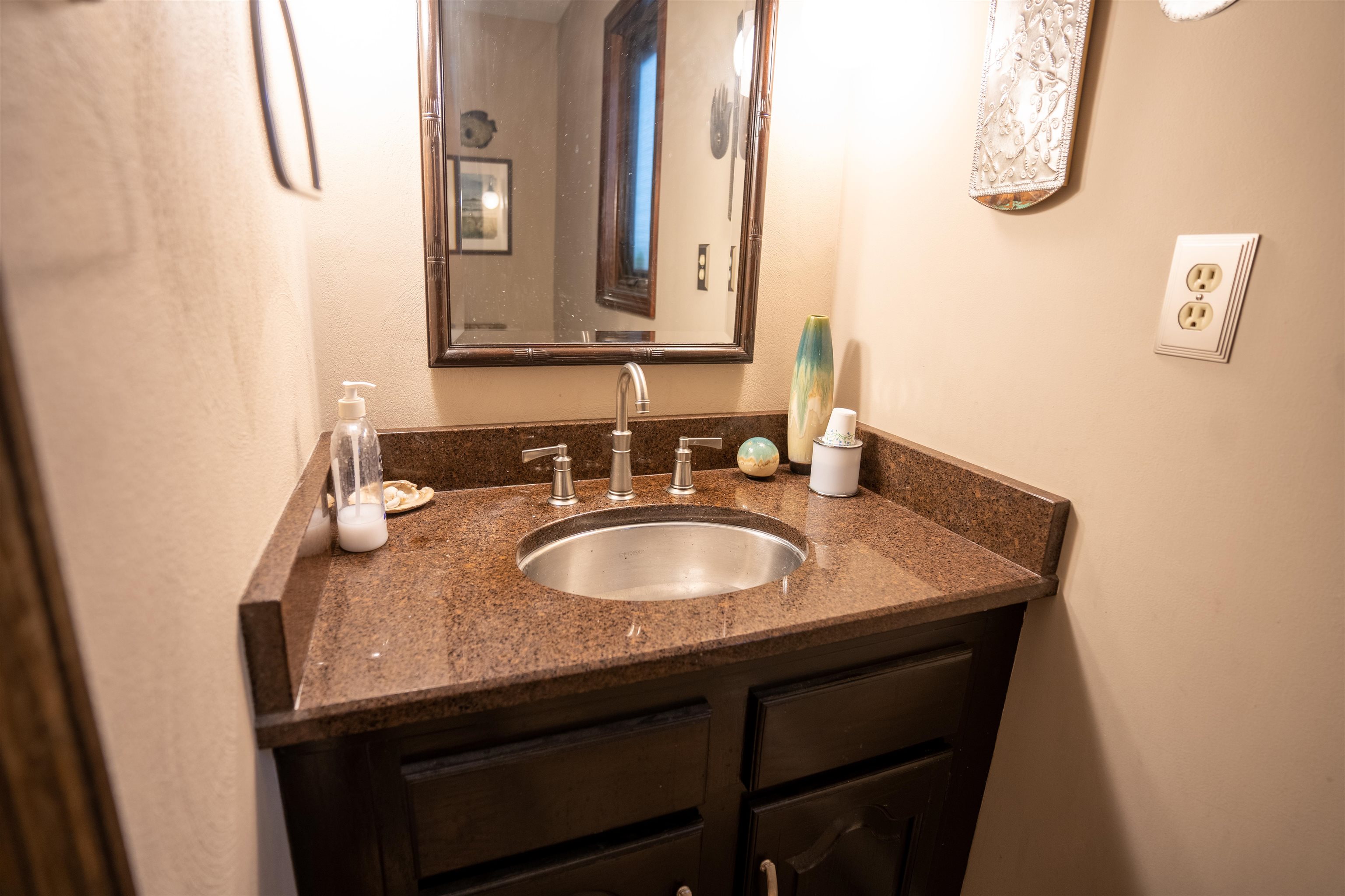 11662 Bend River Road Roscoe, IL 61073 - Photo 7 of 61 a bathroom with a sink and a mirror