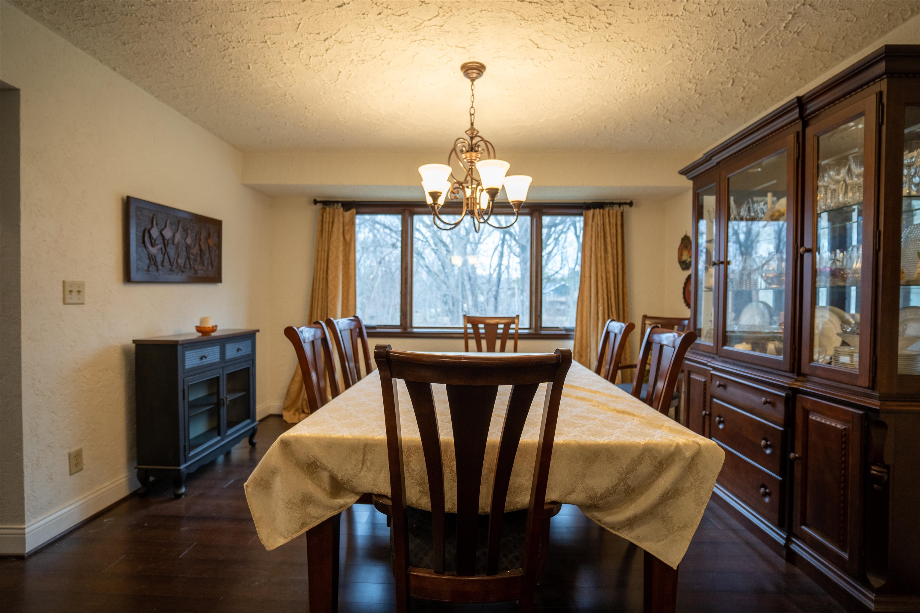 11662 Bend River Road Roscoe, IL 61073 - Photo 9 of 61 a view of a dining room with furniture window and wooden floor