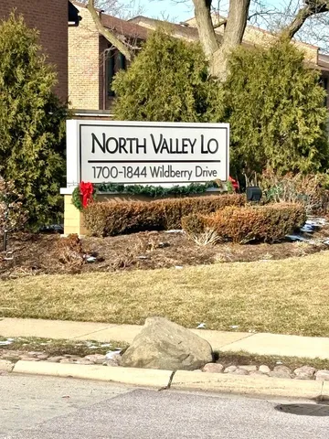 a sign that is on the side of a building