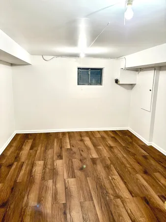 a kitchen with a stove a microwave and a sink